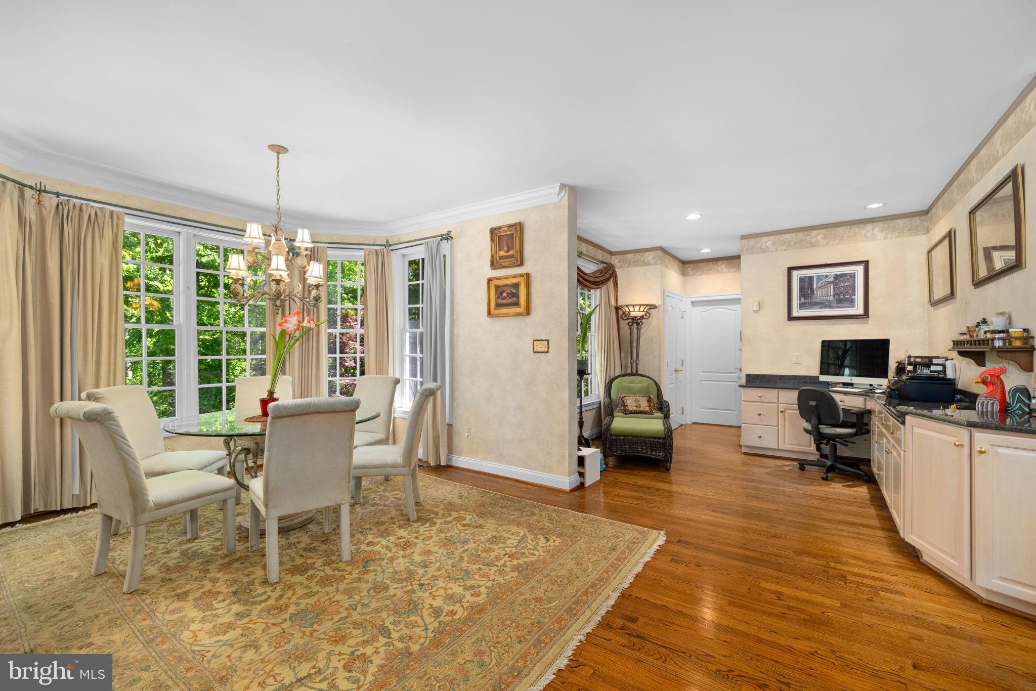 897 Chinquapin Road McLean, VA 22102 - Photo 27 of 66 a living room with furniture or couch and a floor to ceiling window