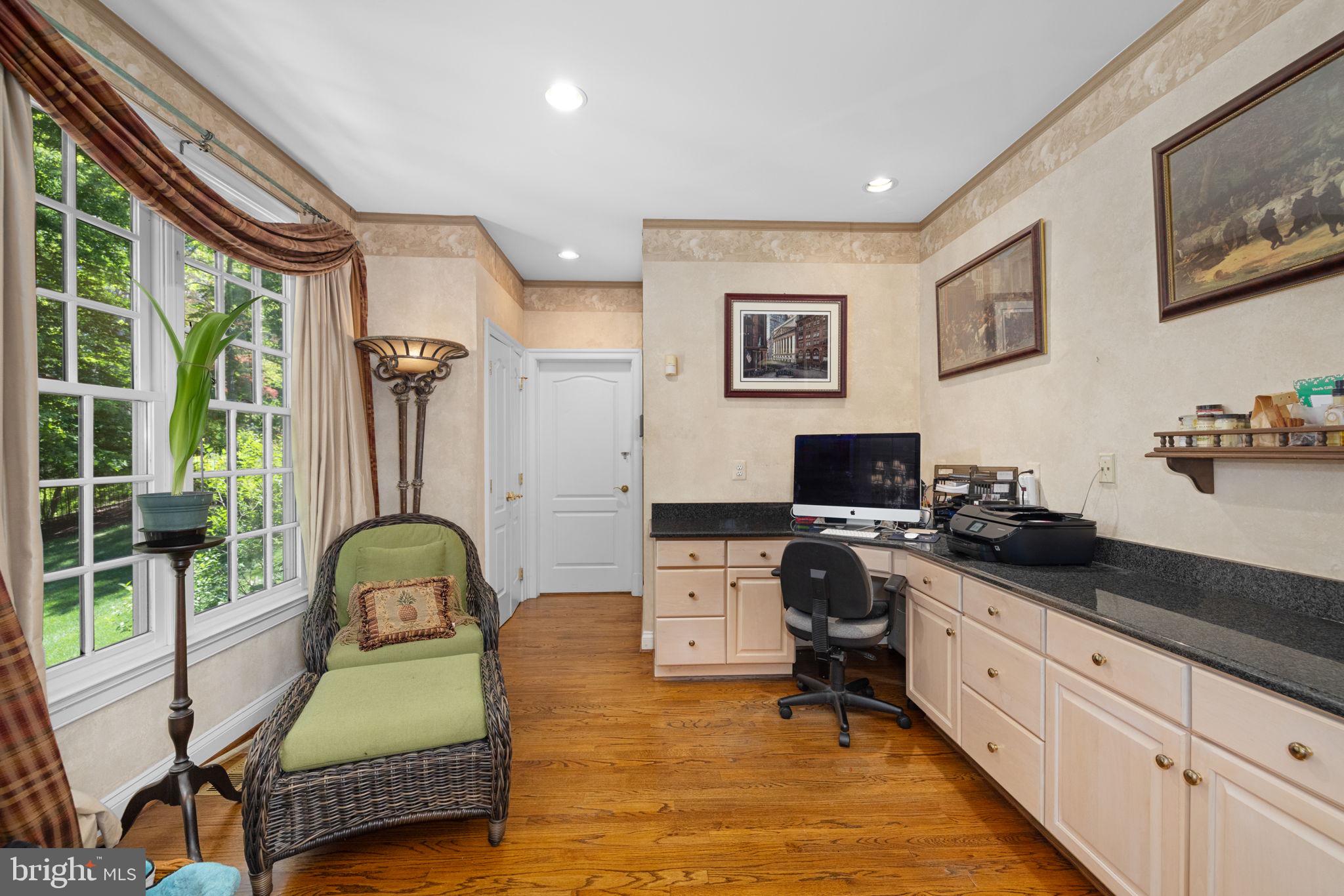 897 Chinquapin Road McLean, VA 22102 - Photo 29 of 66 a living room with furniture and a flat screen tv