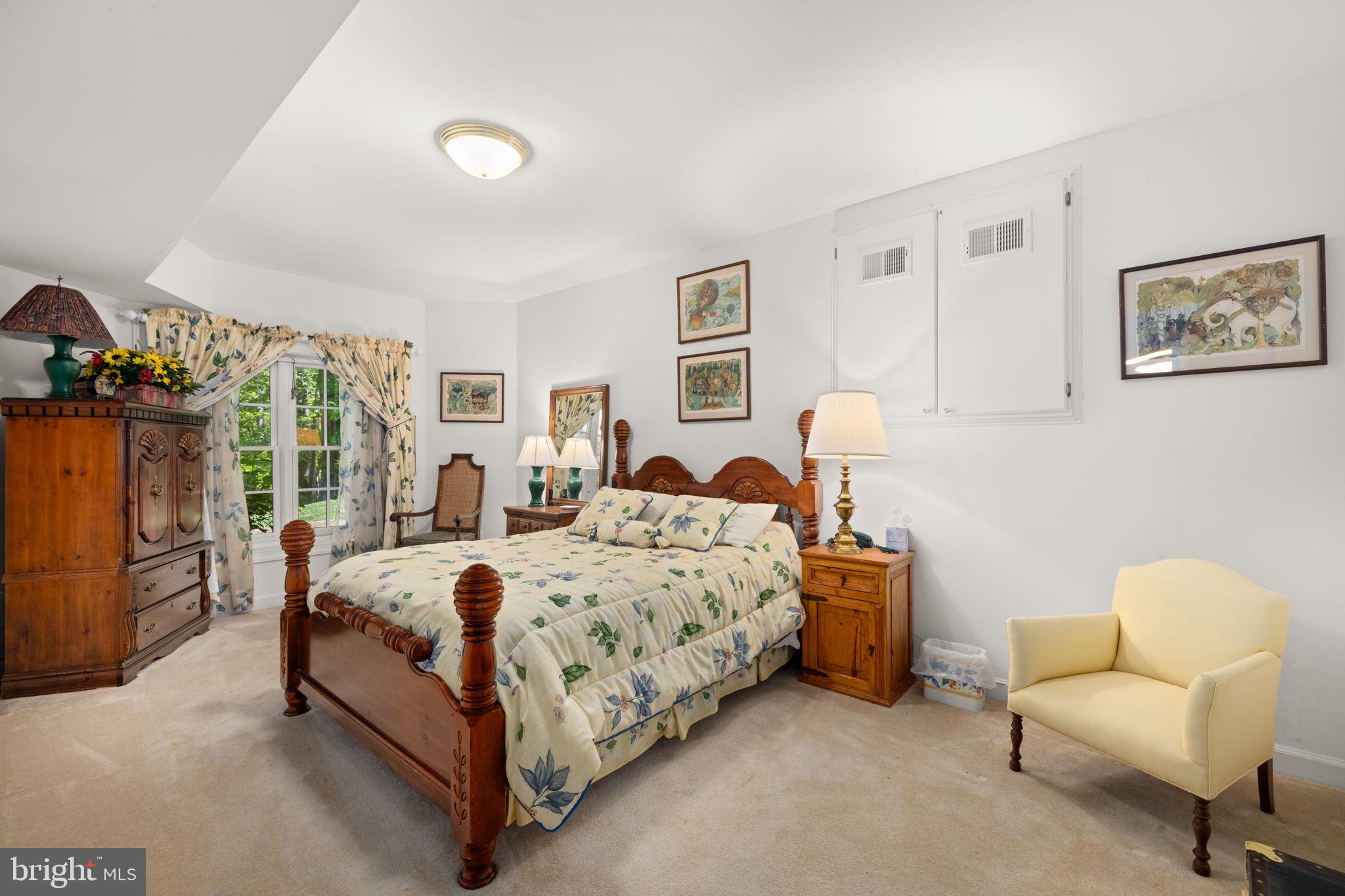 897 Chinquapin Road McLean, VA 22102 - Photo 53 of 66 a bed room with a bed and furniture