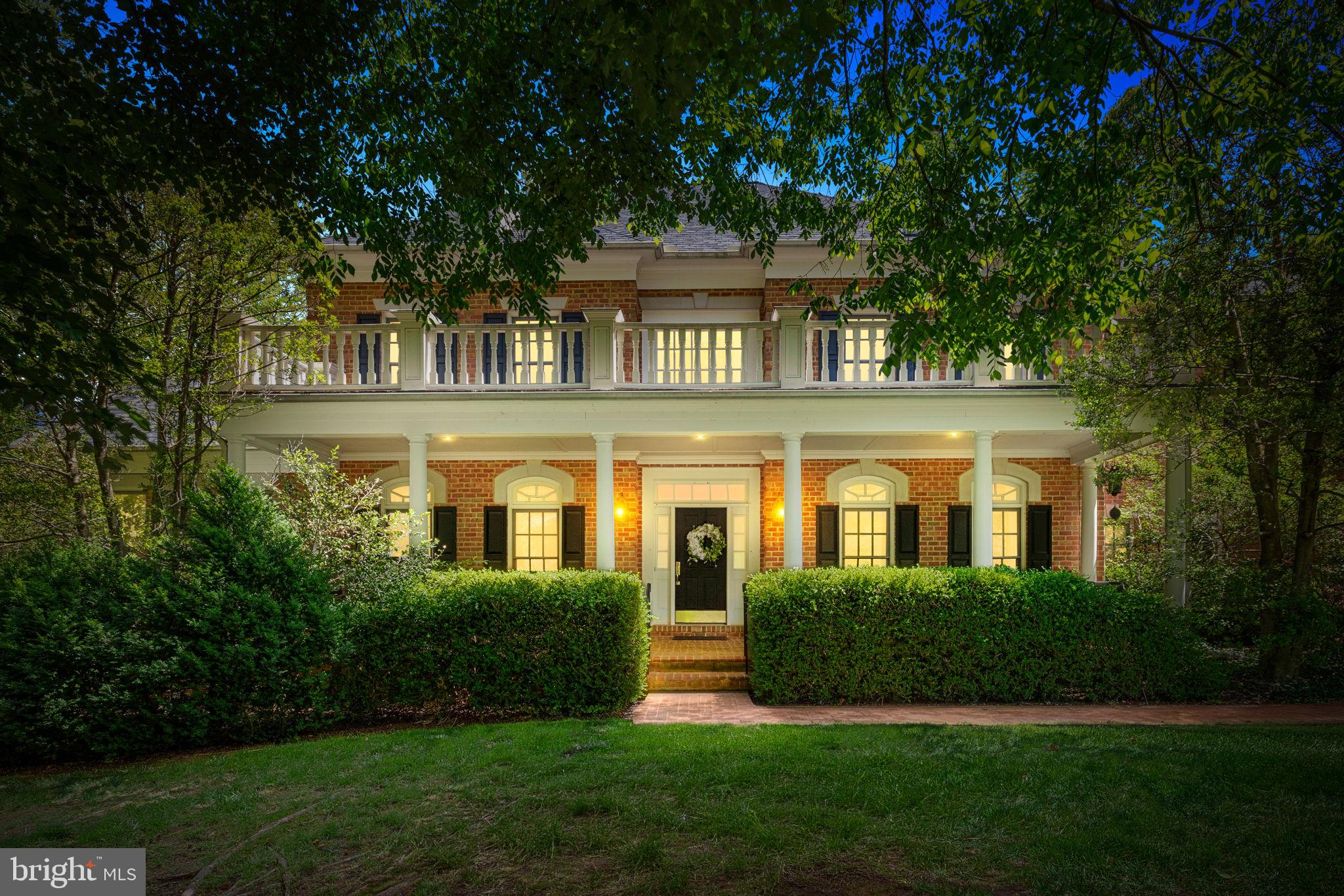 897 Chinquapin Road McLean, VA 22102 - Photo 56 of 66 a front view of a house with a garden