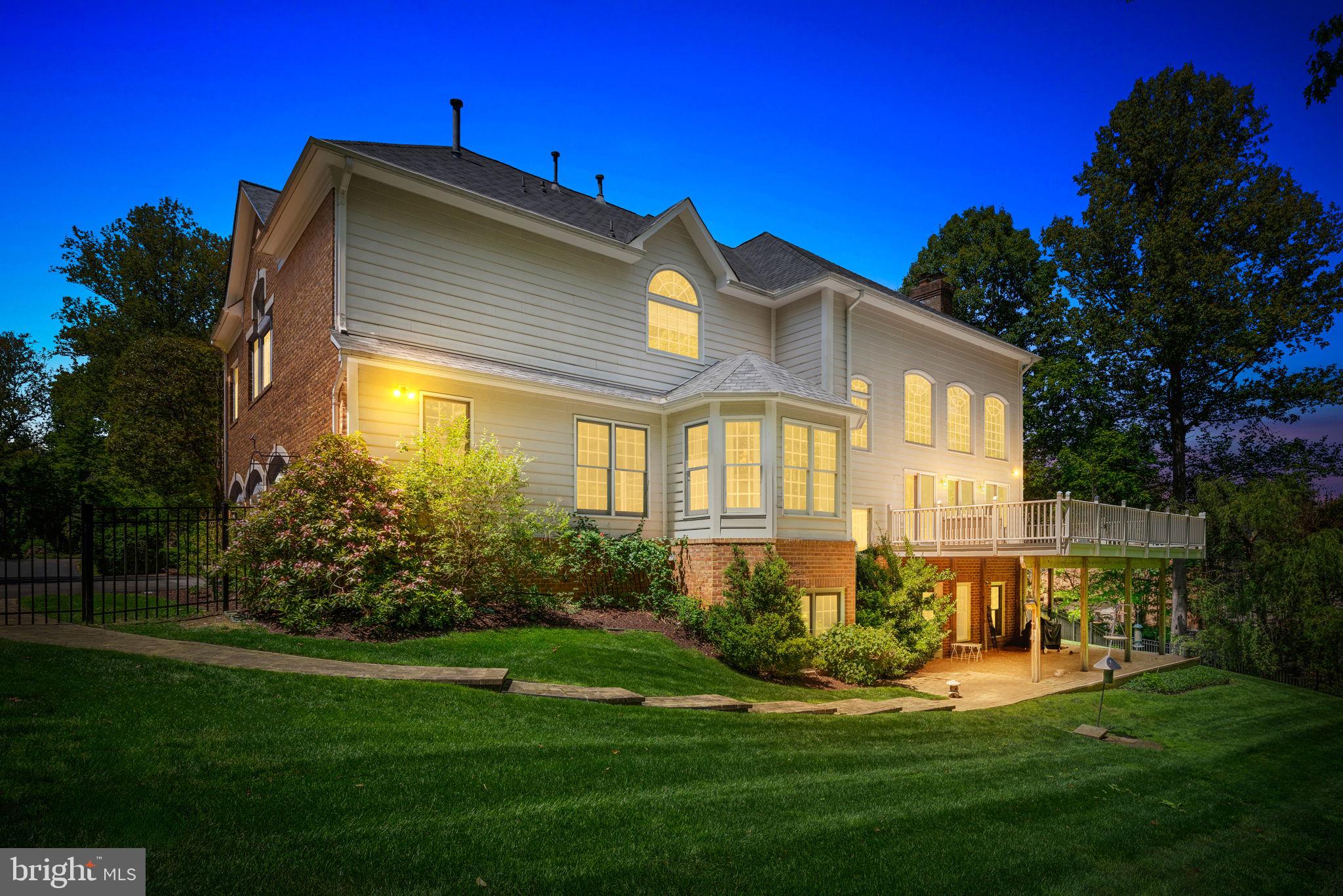 897 Chinquapin Road McLean, VA 22102 - Photo 57 of 66 a front view of a house with a yard