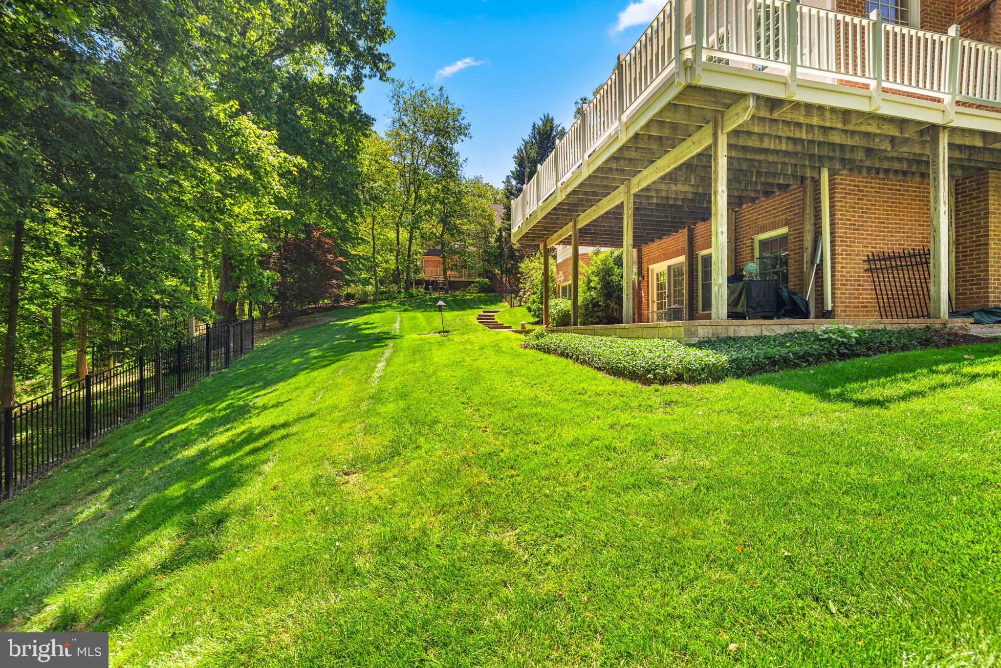 897 Chinquapin Road McLean, VA 22102 - Photo 60 of 66 a view of a big yard with large trees