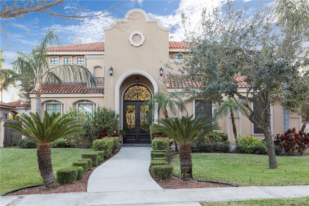 3805 San Clemente Mission, TX 78572 - Photo 1 of 1 Mediterranean / spanish house with french doors, a tile roof, stucco siding, and a front lawn
