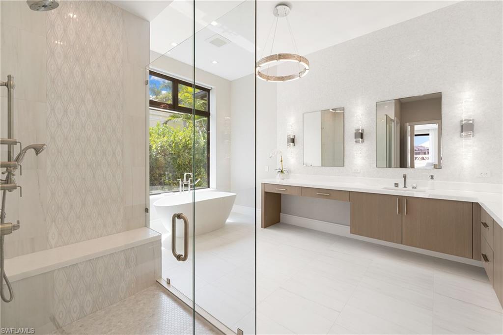 2345 Tarpon Road Naples, FL 34102 - Photo 22 of 43 Full bathroom with vanity, tiled shower, a soaking tub, and recessed lighting