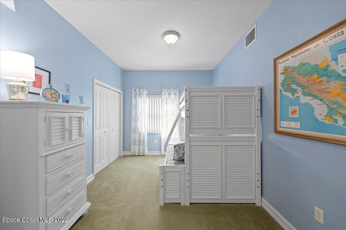 29 Riverside Drive, Unit 303 Cocoa, FL 32922 - Photo 23 of 28 a view of an empty room with stairs and ventilation