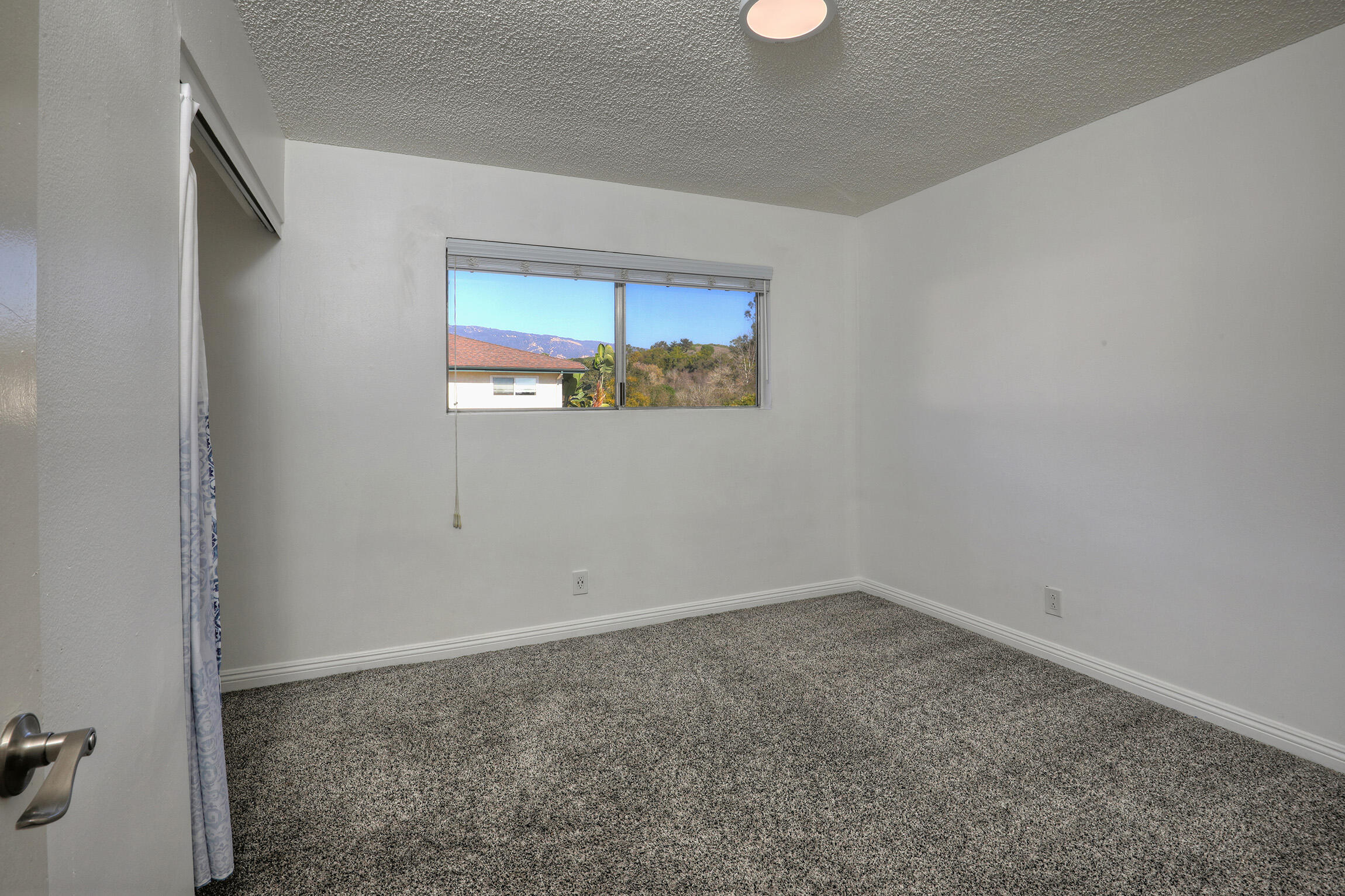361 Northgate Drive, Unit D Goleta, CA 93117 - Photo 15 of 22 an empty room with a window