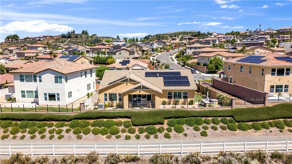 a view of houses with yard