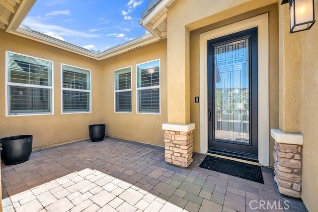 33303 Barmetta Lane Temecula, CA 92592 - Photo 11 of 46 a view of house with backyard of the house