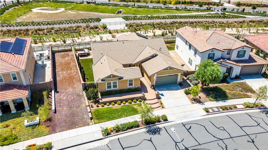 33303 Barmetta Lane Temecula, CA 92592 - Photo 3 of 46 a aerial view of a house with a yard and furniture