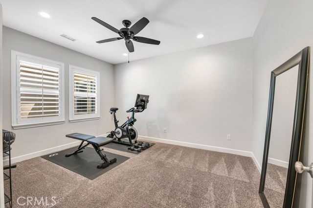 33303 Barmetta Lane Temecula, CA 92592 - Photo 34 of 46 a view of workspace with a window and gym equipment