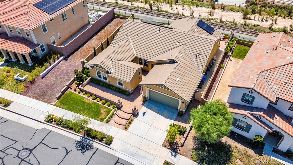 33303 Barmetta Lane Temecula, CA 92592 - Photo 8 of 46 an aerial view of a house with a yard