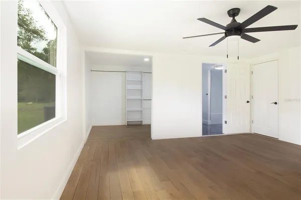 an empty room with windows