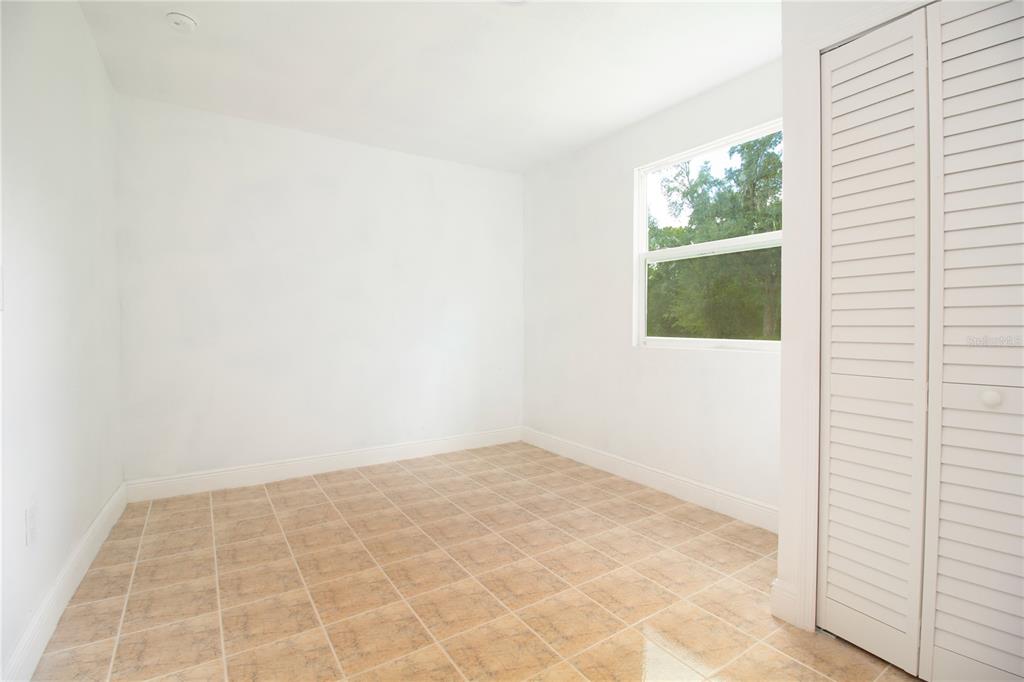 39912 Jerry Road Zephyrhills, FL 33540 - Photo 34 of 59 an empty room with windows