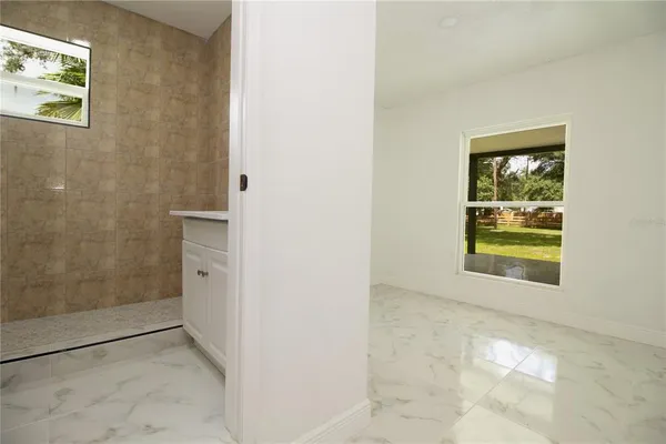 a view of a house with a big yard