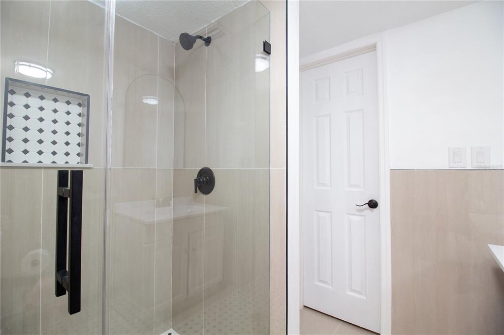 39912 Jerry Road Zephyrhills, FL 33540 - Photo 40 of 59 a bathroom with a shower