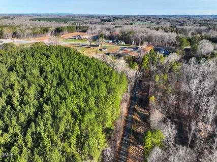 a view of dirt yard and mountain view
