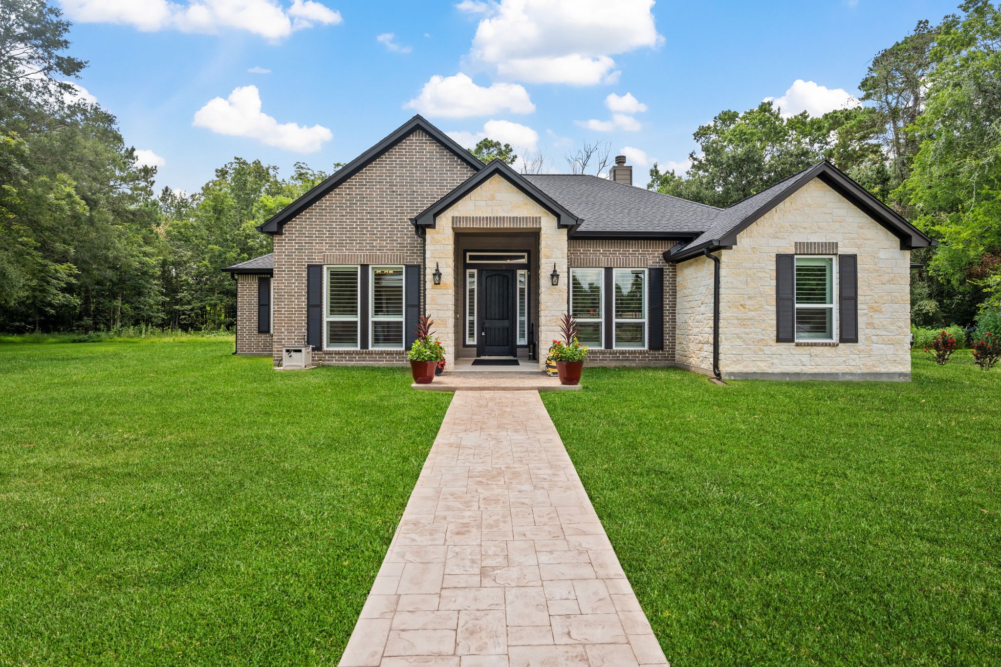 3004 Tyler Street Dayton, TX 77535 - Photo 2 of 34 a view of front of a house with a yard