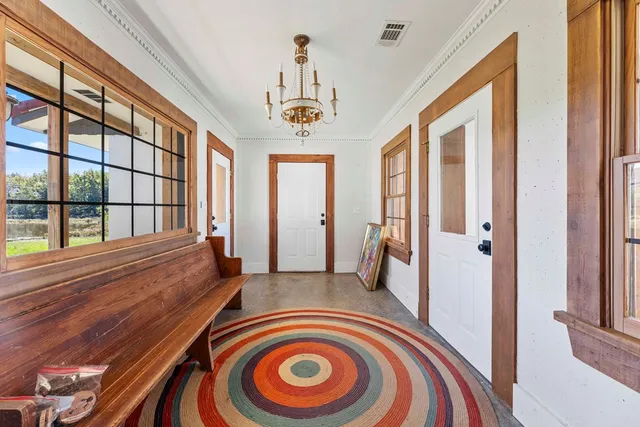a living room with furniture fireplace and a flat screen tv
