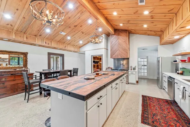 a bed room with bed and a large window