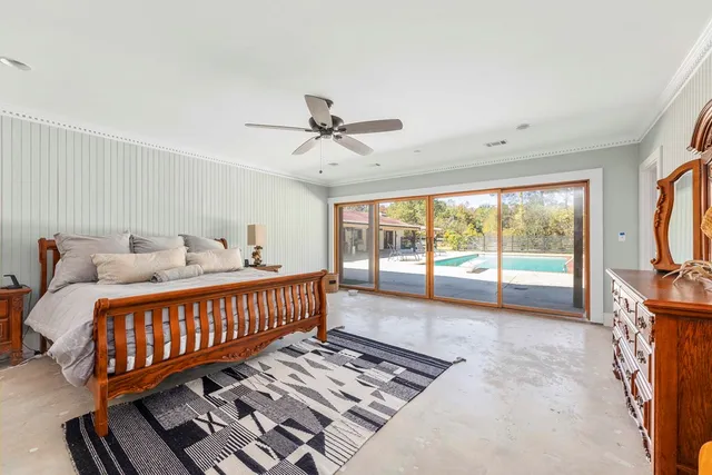 a bathroom with a double vanity sink a mirror and shower