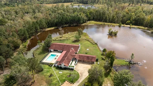 a view of backyard with green space
