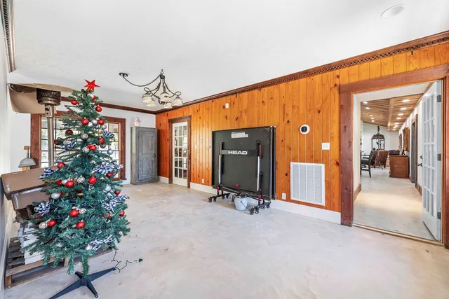 a view of kitchen with furniture and wooden floor