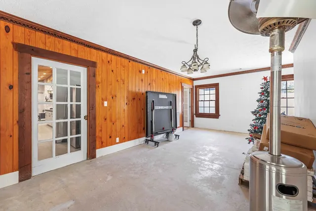 a front view of a house with a yard table and chairs