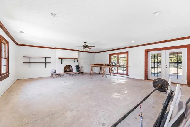 a view of a house with swimming pool and sitting area