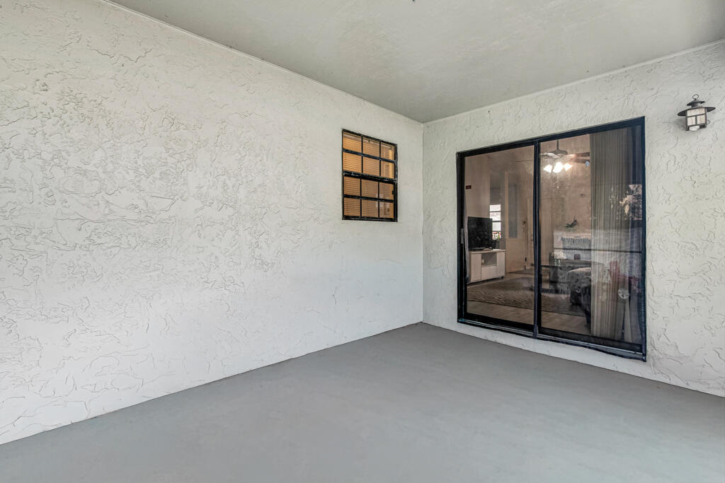 23428 Country Club Drive East Boca Raton, FL 33428 - Photo 30 of 32 a view of a room with an empty space