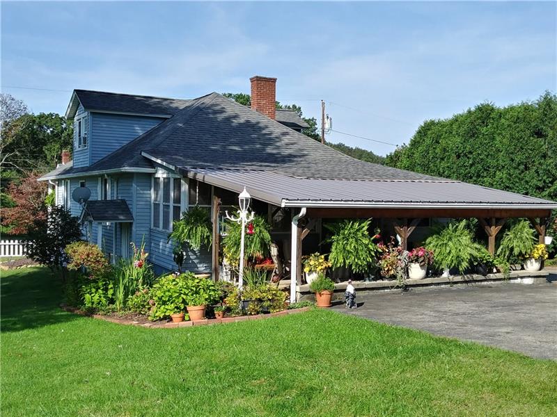 632 Cemetery Road Perryopolis, PA 15473 - Photo 18 of 25 Rear View Of The Porch & Additional Parking Area