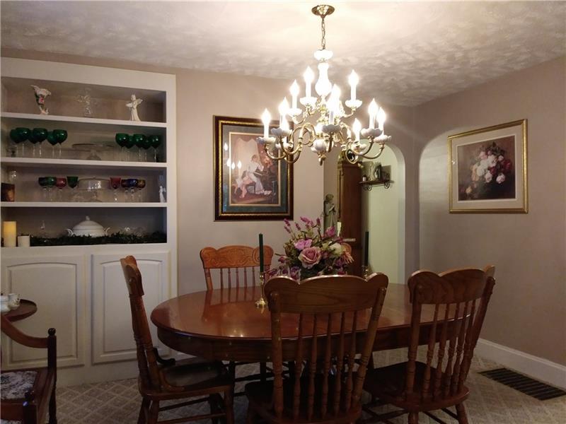 632 Cemetery Road Perryopolis, PA 15473 - Photo 3 of 25 Dining Area Features Built-In Cupboard - Chandelier DOES NOT STAY
