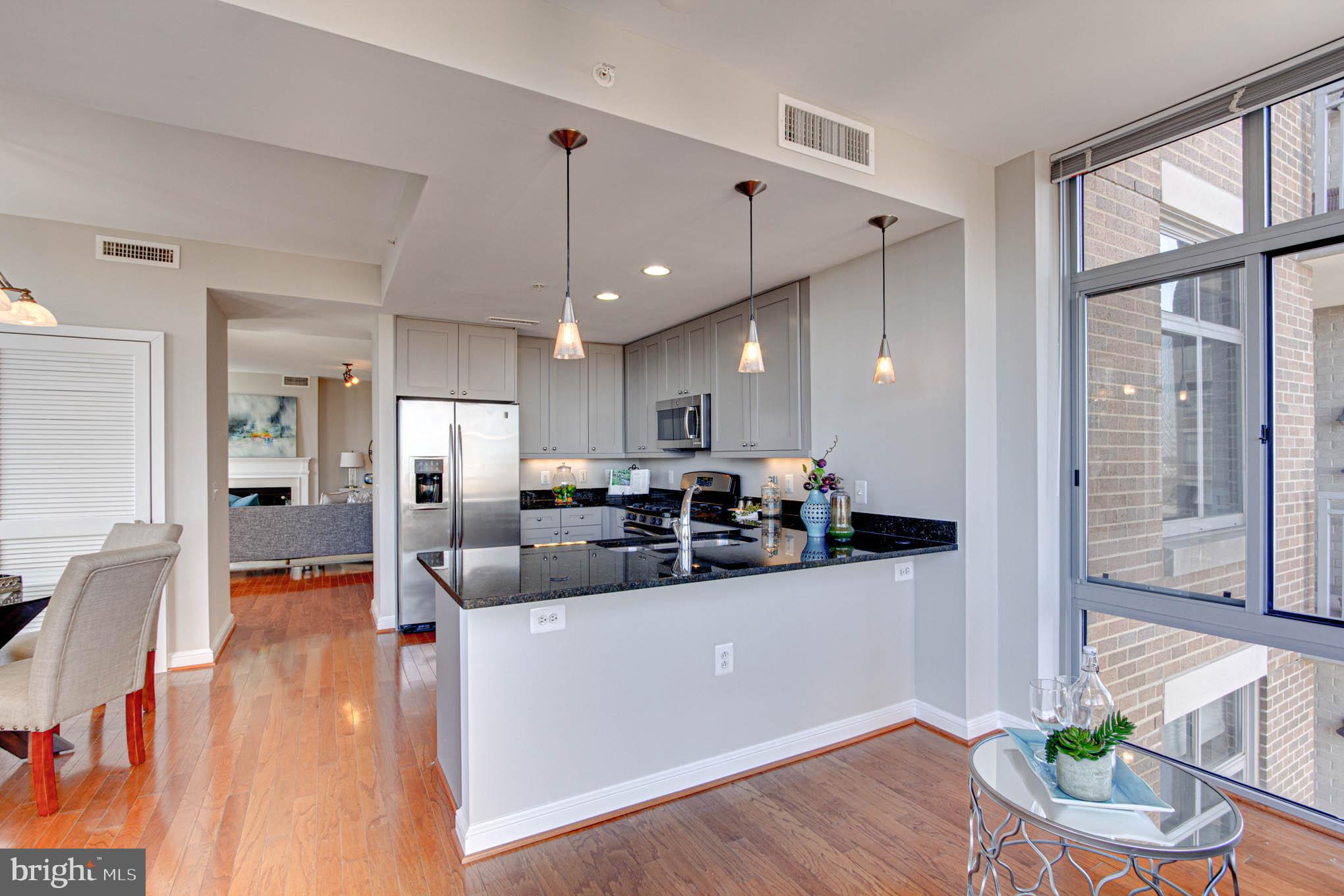11990 Market Street, Unit 817 Reston, VA 20190 - Photo 18 of 75 Family Room - Kitchen