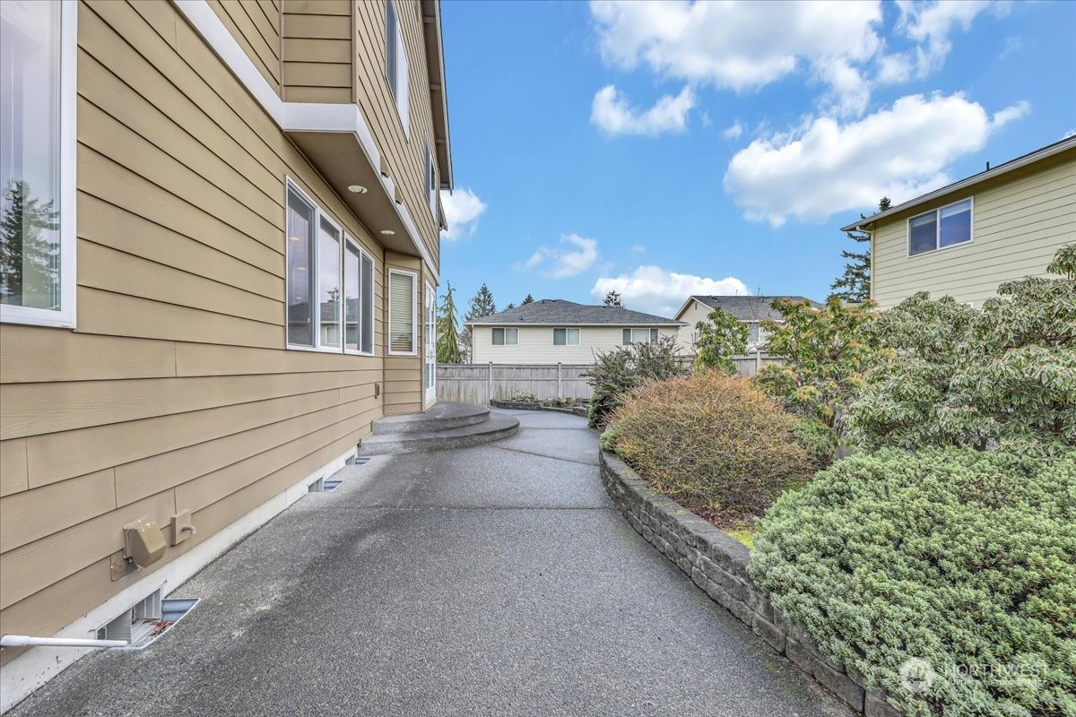4604 Northeast 1st Court Renton, WA 98059 - Photo 39 of 40 a view of a house with a street