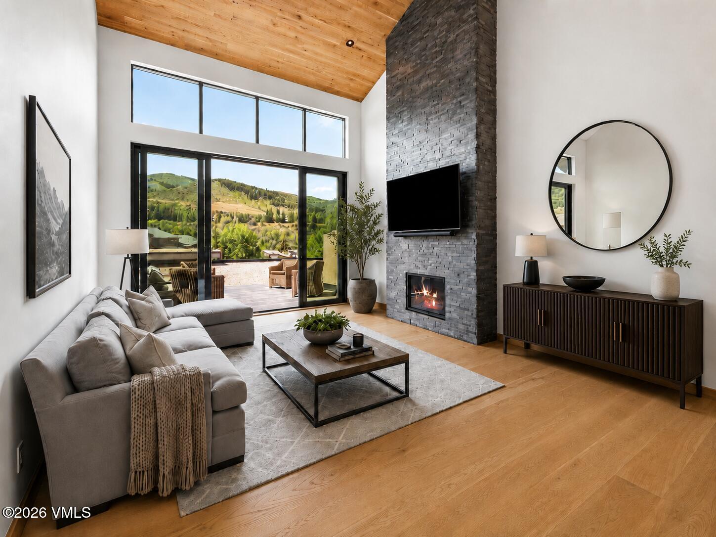 137 Benchmark Road, Unit 214W Avon, CO 81620 - Photo 1 of 9 Living Room_Web