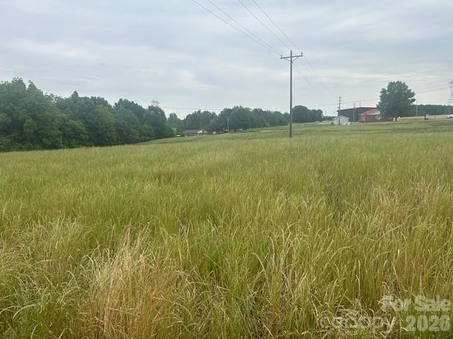 0 Old Pageland Marshville Road Wingate, NC 28174 - Photo 13 of 16 a view of a lake with a big yard