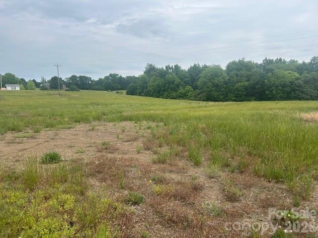 0 Old Pageland Marshville Road Wingate, NC 28174 - Photo 5 of 16 a view of a lake with houses in the back