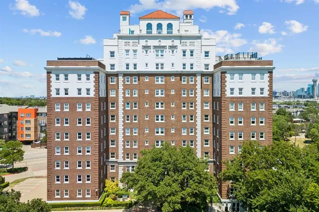 a view of a city with tall buildings
