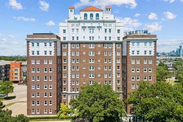 a view of a city with tall buildings