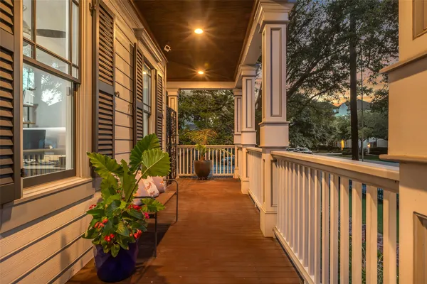 a view of a porch with a potted plant