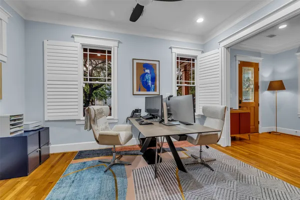 a workspace with furniture and window