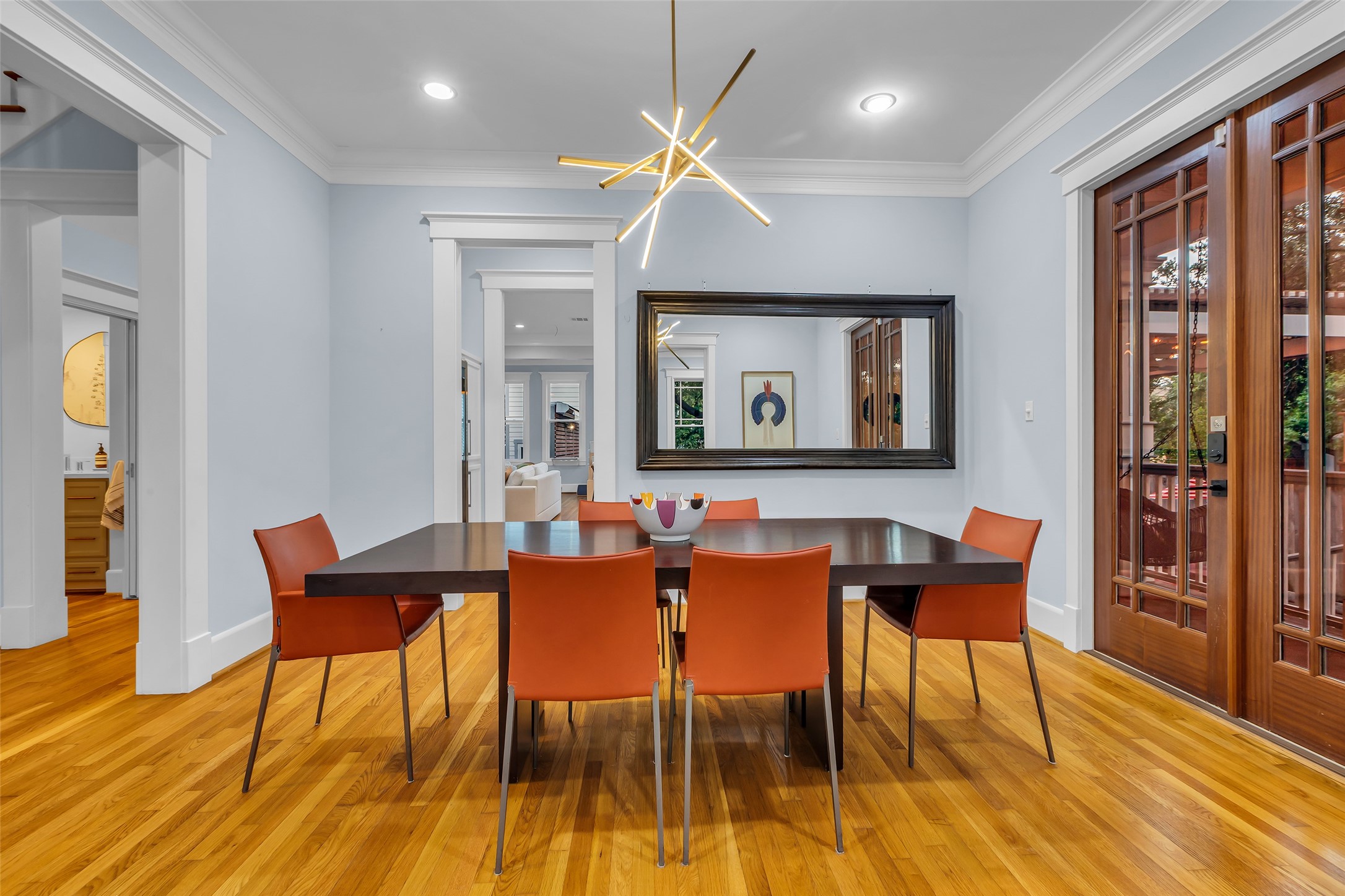 340 West 17th Street Houston, TX 77008 - Photo 10 of 40 a view of a dining room with furniture and wooden floor