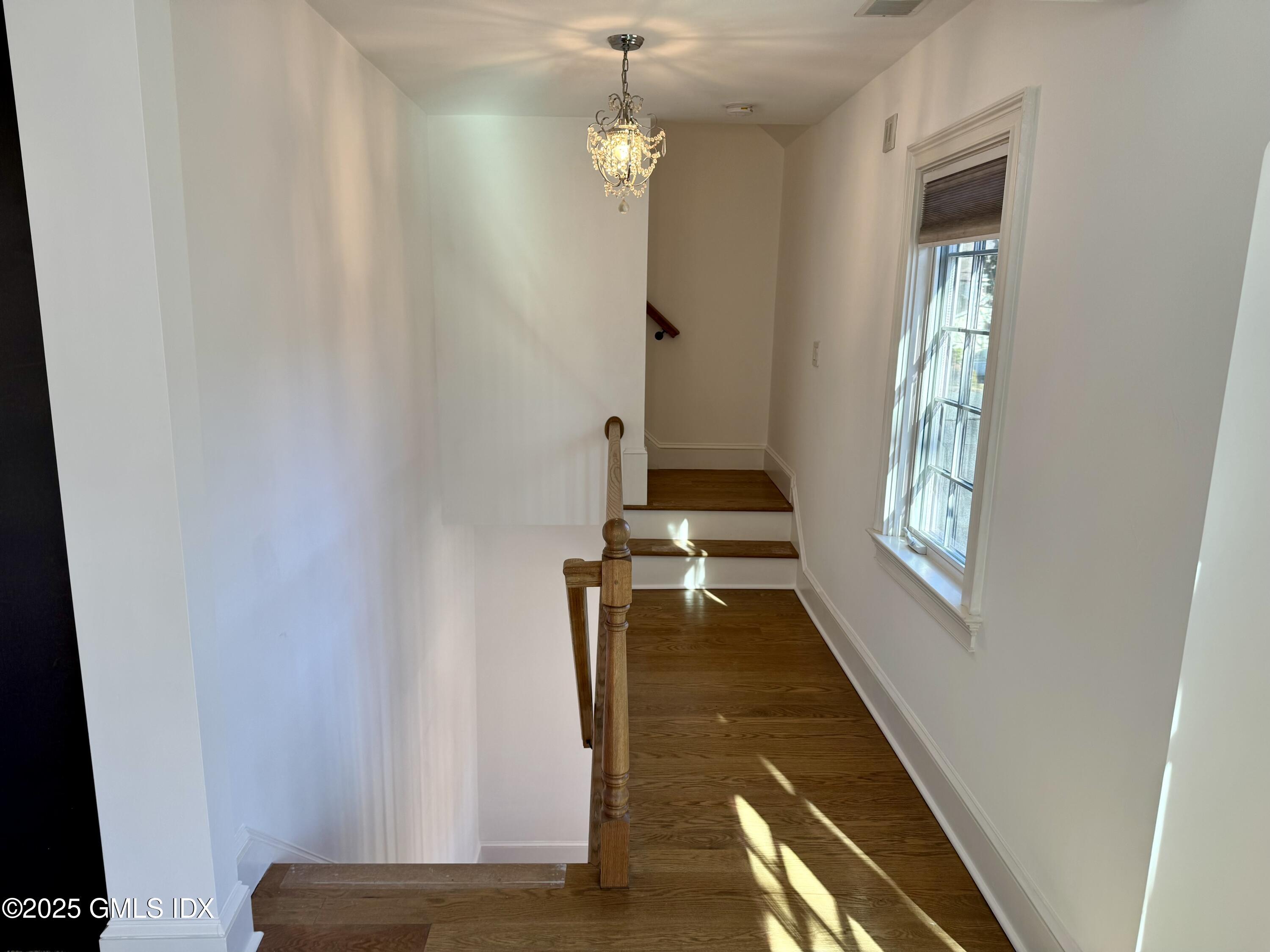 48 Richland Road Greenwich, CT 06830 - Photo 9 of 18 a view of staircase with a rug