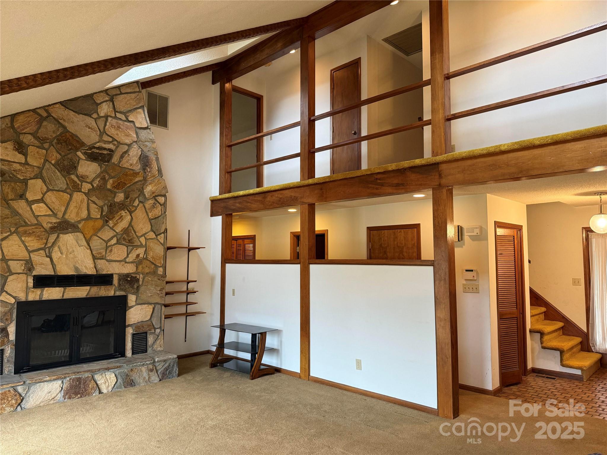6102 Unity Lane Northwest Concord, NC 28027 - Photo 4 of 17 a view of a living room with a fireplace