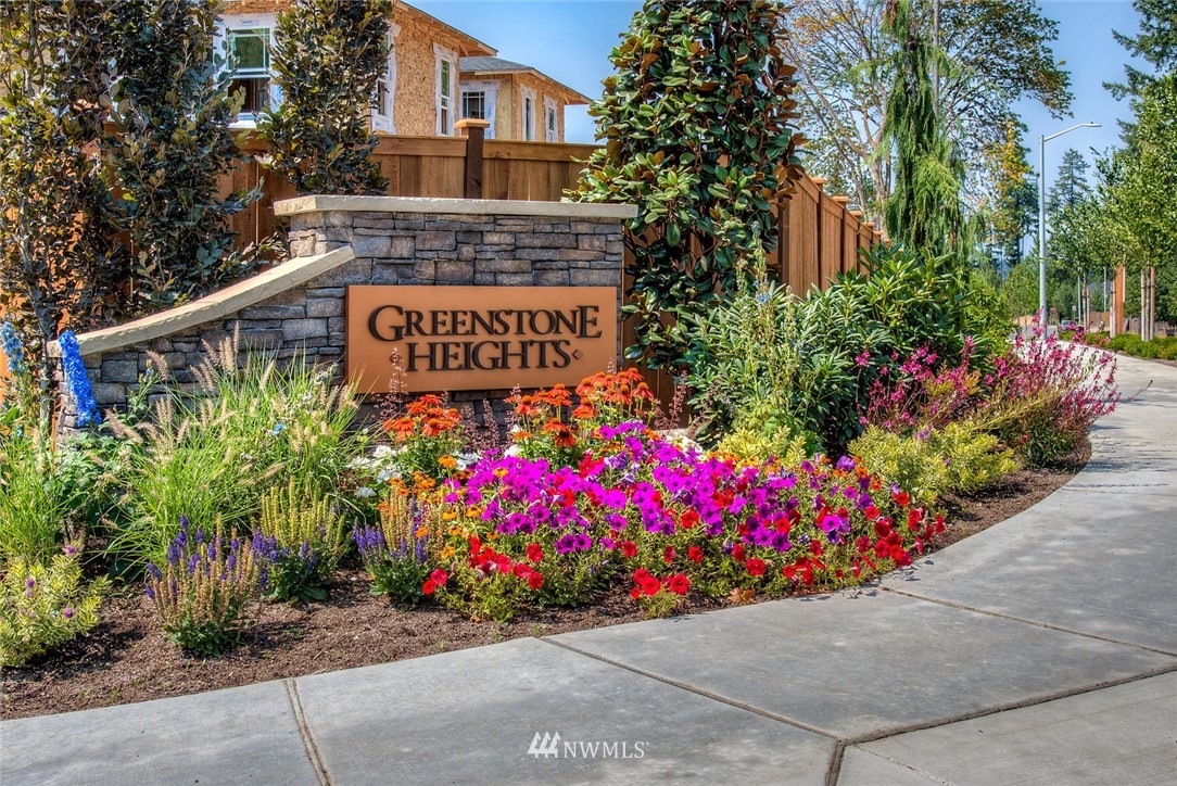 21638 35th Avenue Southeast, Unit 21 Bothell, WA 98021 - Photo 4 of 25 a street sign on the side of the road