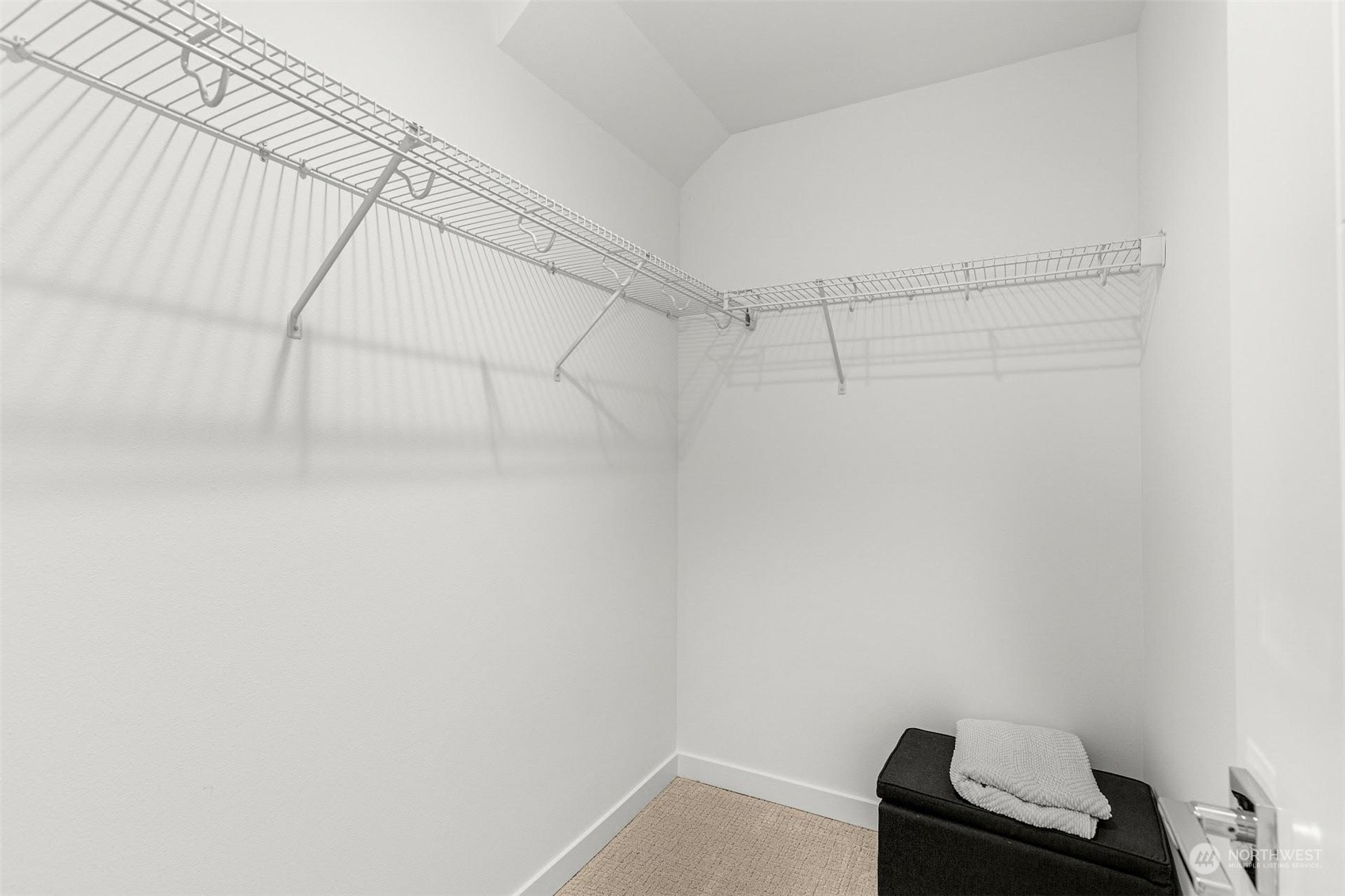 10152 Holman Road Northwest Seattle, WA 98133 - Photo 12 of 24 a view of a room with racks on the wall