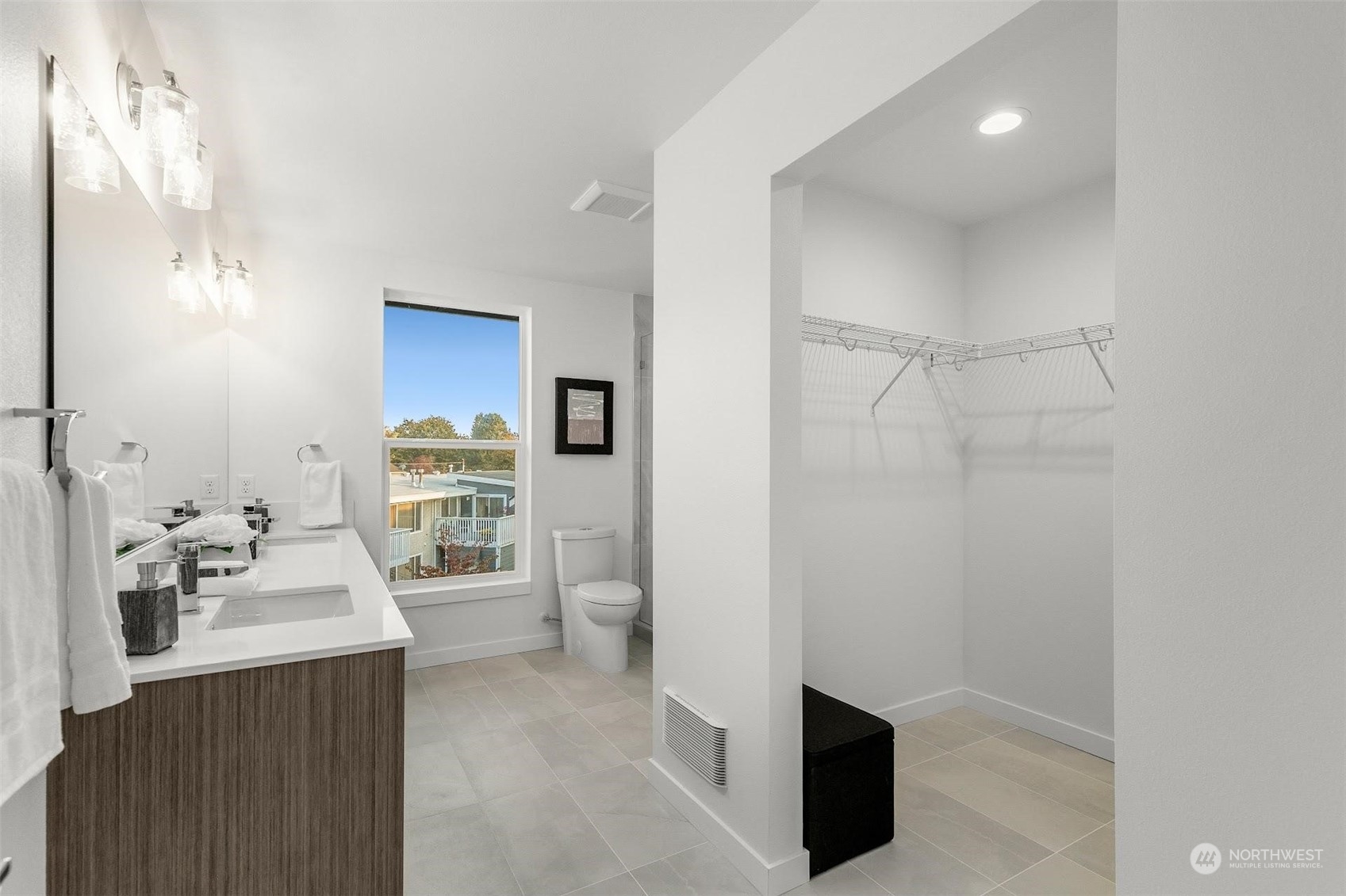 10152 Holman Road Northwest Seattle, WA 98133 - Photo 18 of 24 a bathroom with a sink toilet and shower