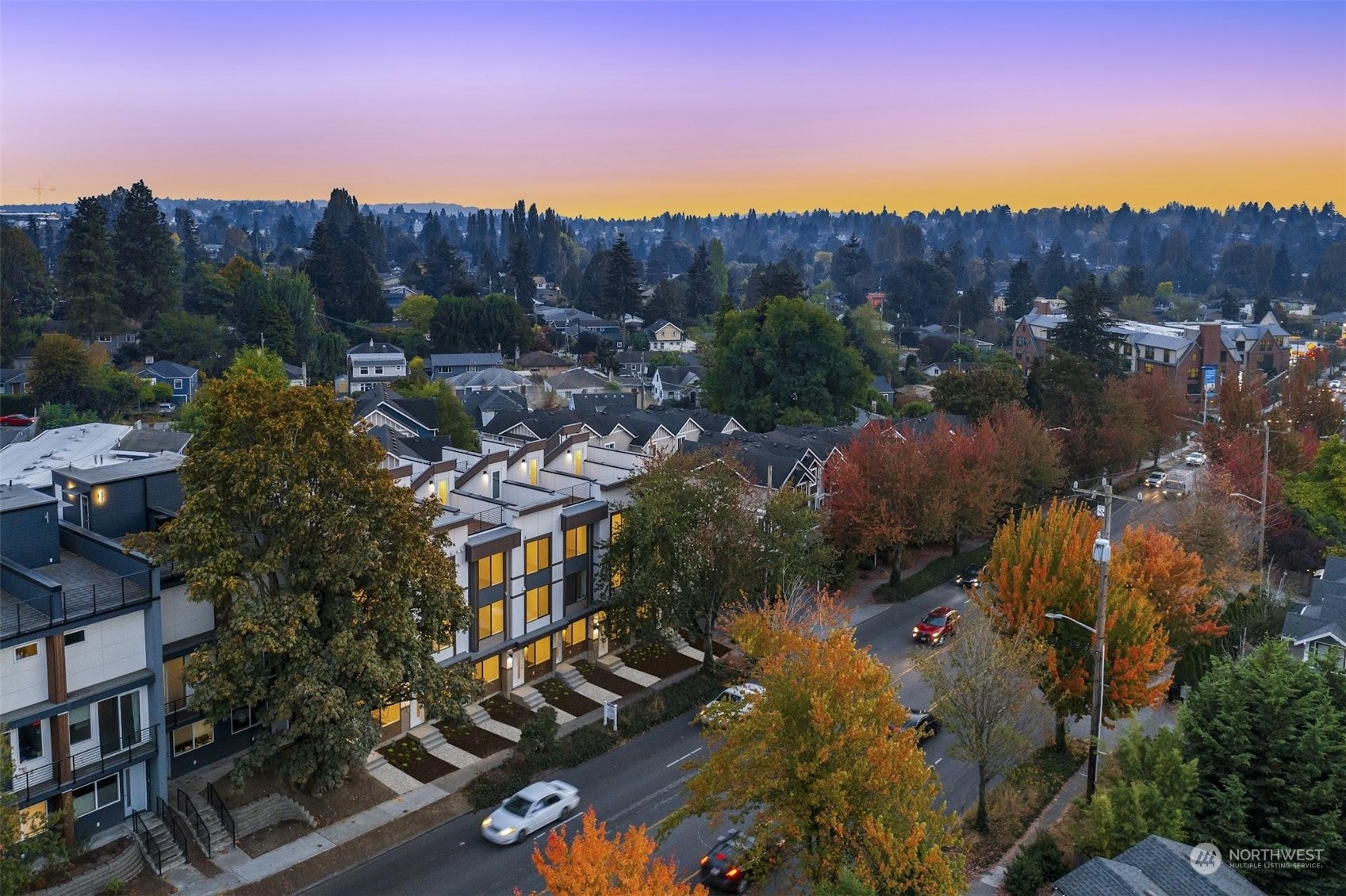 10152 Holman Road Northwest Seattle, WA 98133 - Photo 22 of 24 a view of a town with mountains in the background