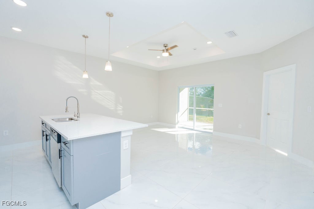 4419 22nd Street Southwest Lehigh Acres, FL 33973 - Photo 21 of 31 a bathroom with a sink a window and a mirror