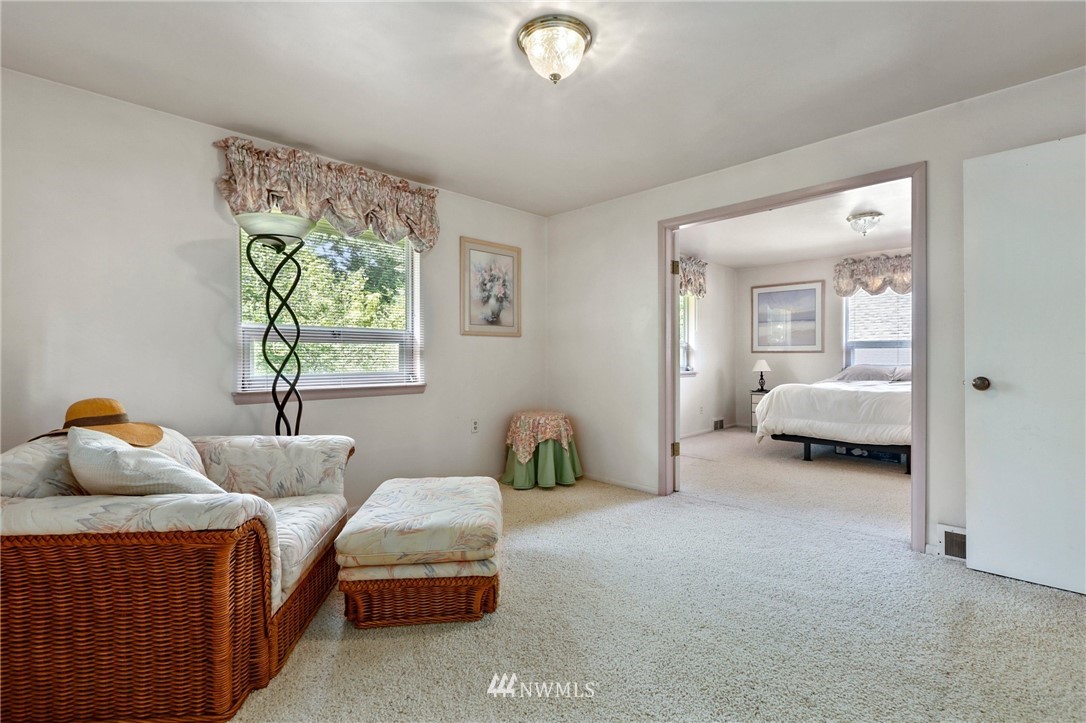 717 224th Street Southwest Bothell, WA 98021 - Photo 16 of 40 a bedroom with two beds and a window
