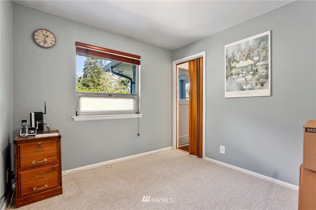 717 224th Street Southwest Bothell, WA 98021 - Photo 20 of 40 a bedroom with a bed and a window